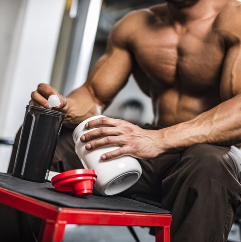 young-man-preparing-his-protein-drink-royalty-free-image-